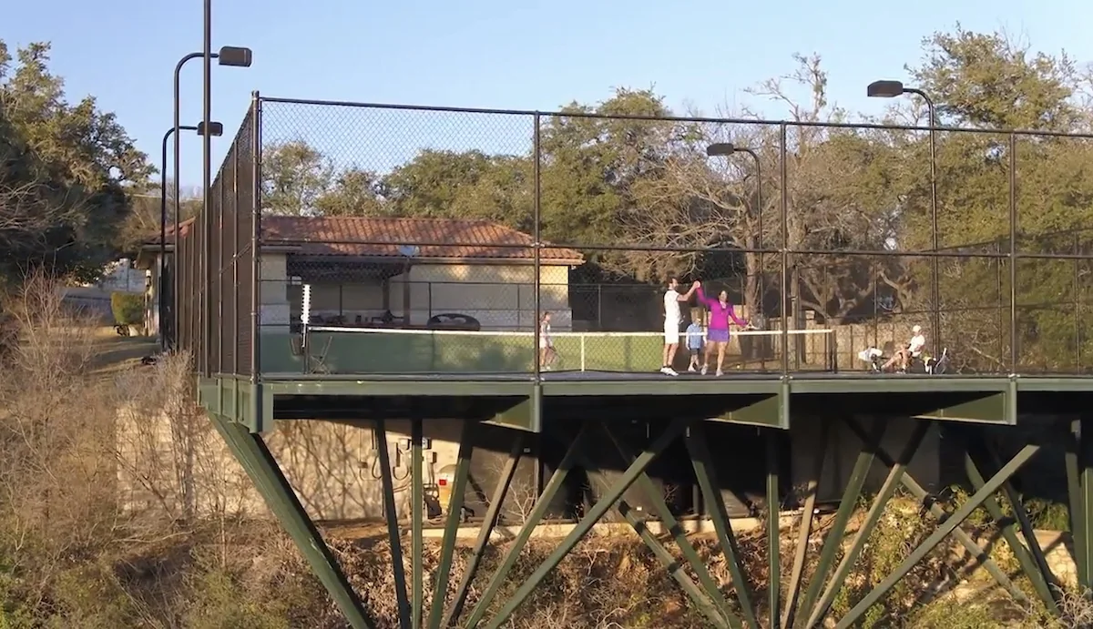 FIG. 09 — PLAYERS ON THE CANTILEVERED COURT